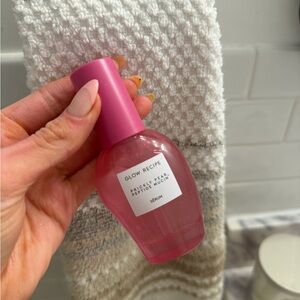 Glow Recipe pink serum bottle with matching cap
